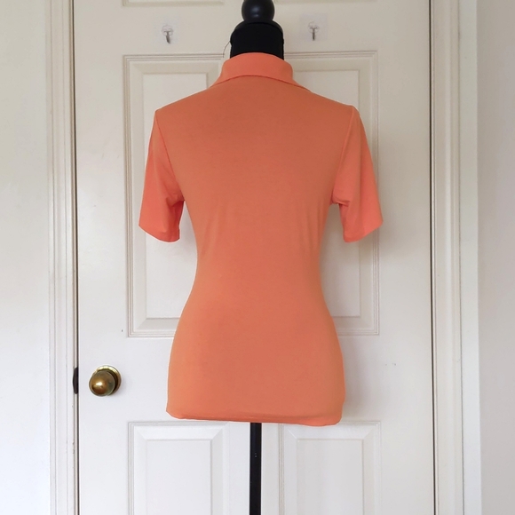 NWOT. The Limited Rayon and Spandex Orange Short Sleeve Polo with big buttons. - Picture 2 of 4